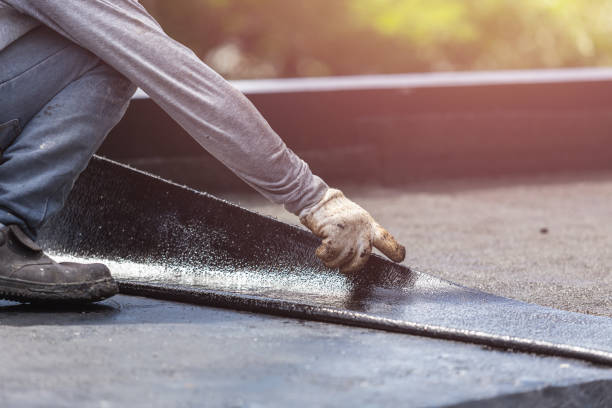 Professional Basement Waterproofing technician working in Paragon, IN